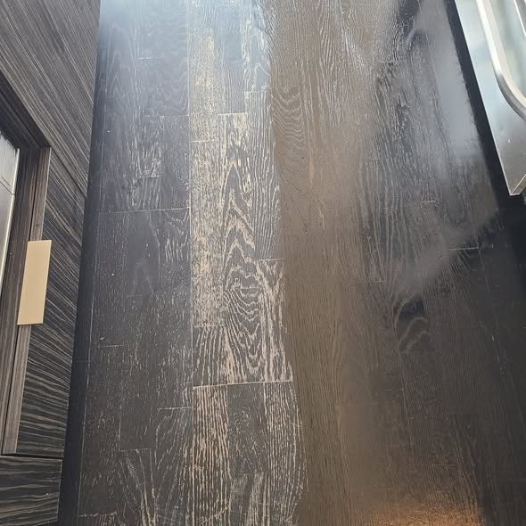 Close-up of dark wood-look flooring